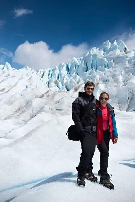 A view of couple doing ice trekking on Perito Moreno glacier in Patagonia