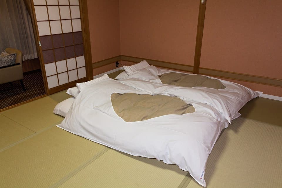 futon bed in a ryokan on tatami mats