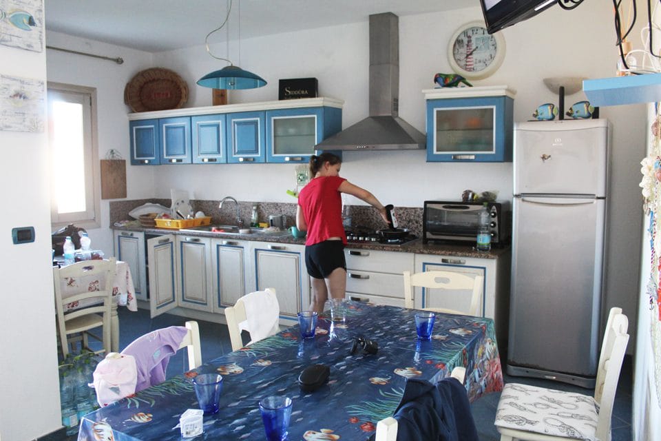 a woman working in the kitchen