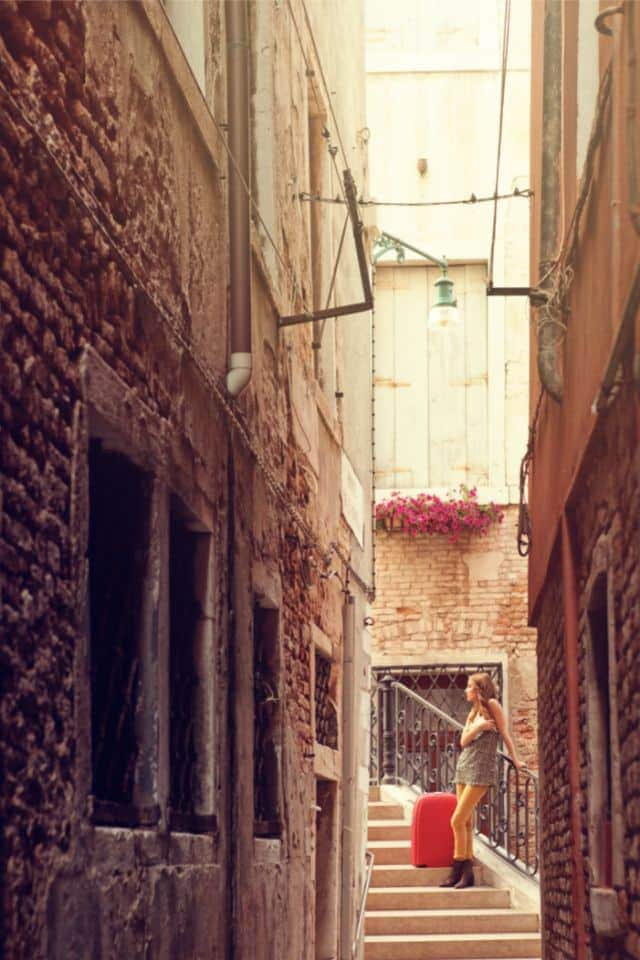 tourist with a luggage in venice by mammuth