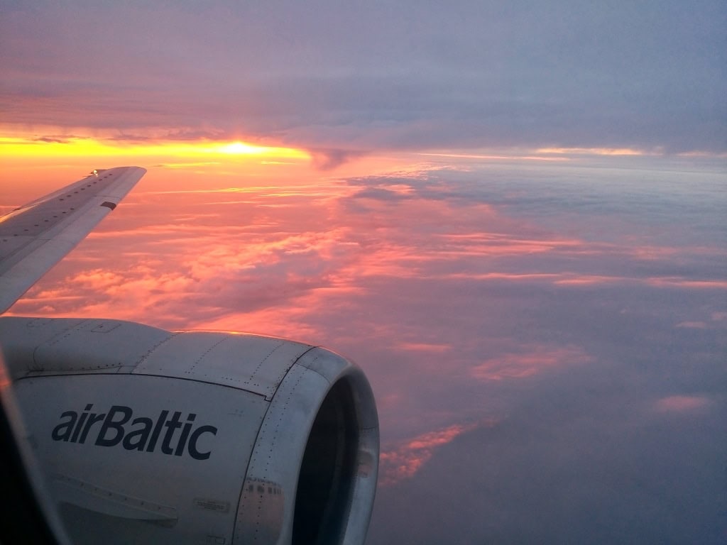 flying during a sunrise - flying for the first time can be exhilarating or scary, depending on how prepared you are