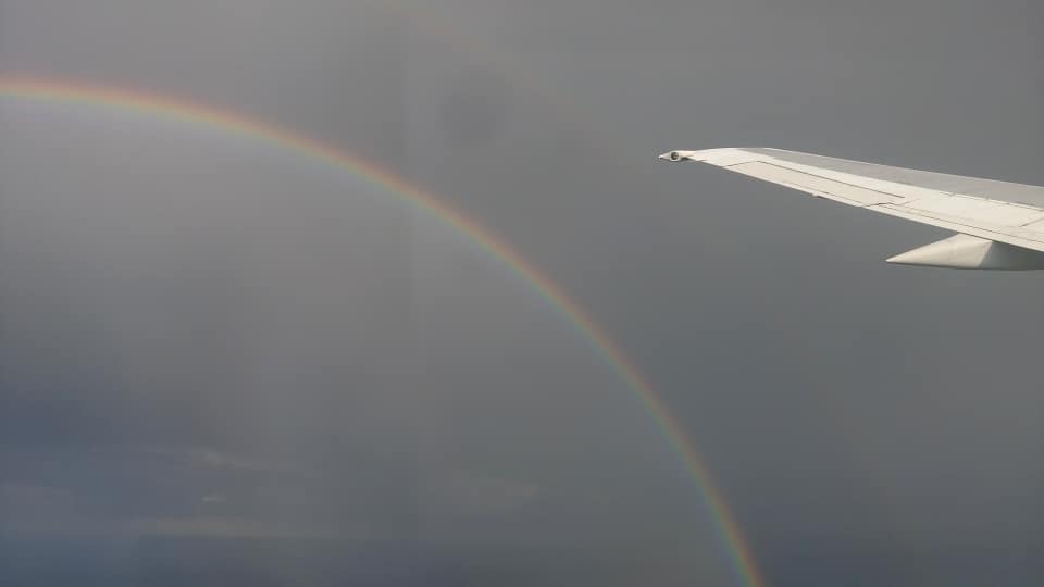 rainbow as seen from a flying airplane