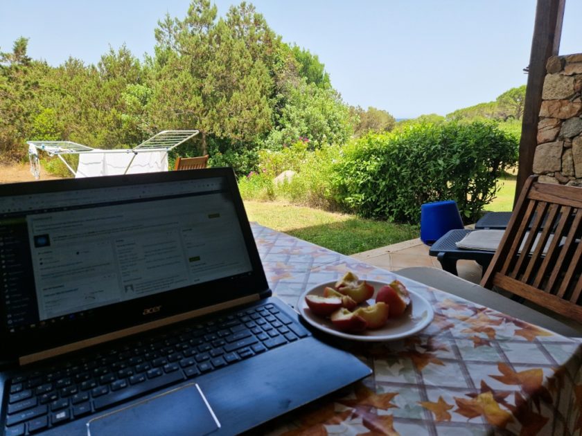 working on a terrace in a hotel in sardina