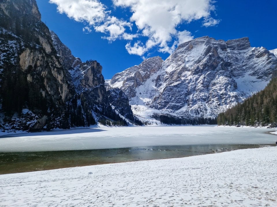 view of lake braies from the boat house dolomites italy