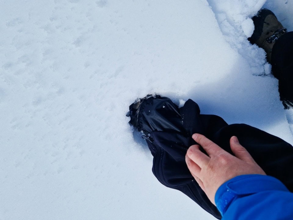 shoe in the snow in lake braies dolomites italy