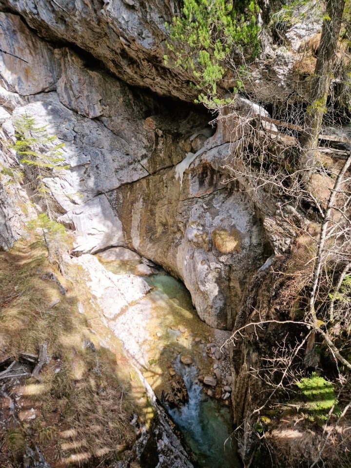 a small trickle in the forra del felizon waterfall in dolomites italy