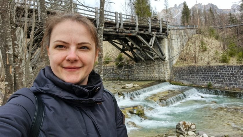 a selfie by a river in cortina d'ampezzo in dolomites italy