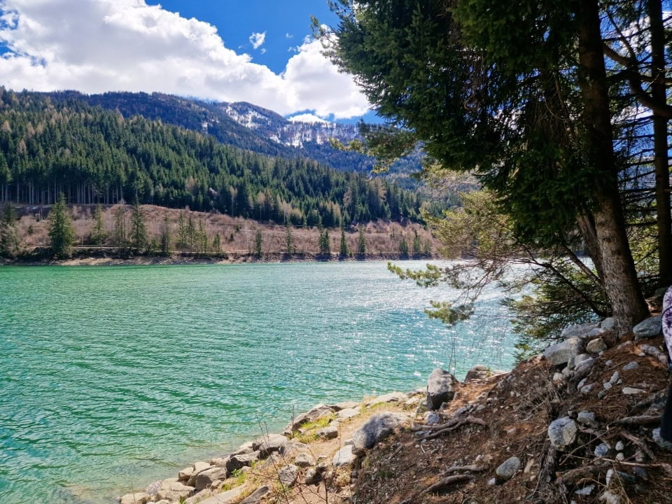 turquoise green waters of lake valdaora in dolomites italy