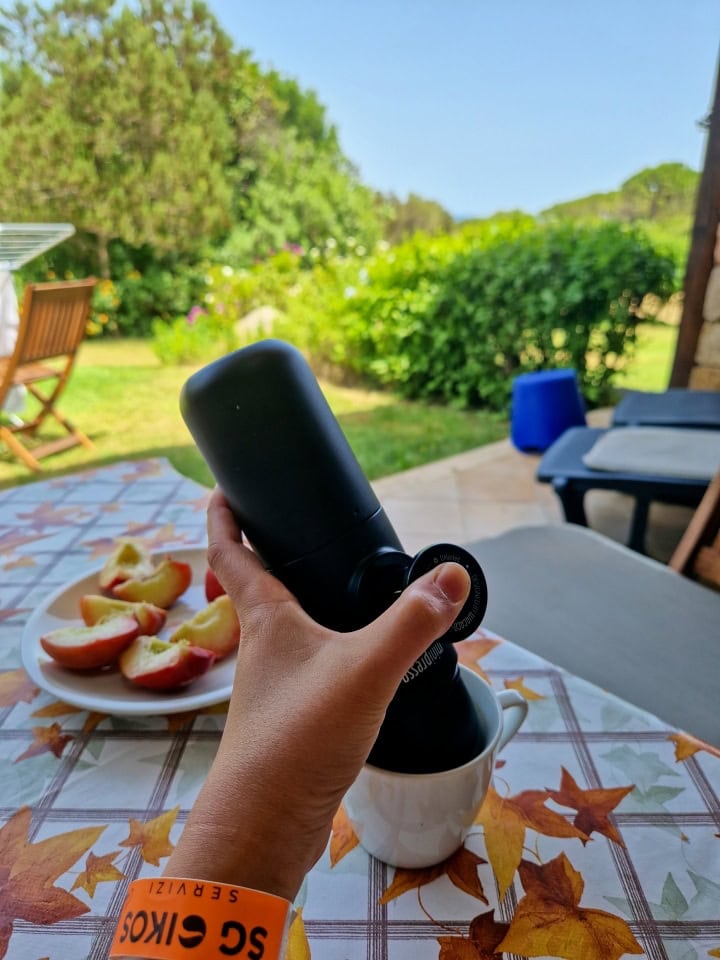 making coffee with a travel coffee maker in sardinia italy