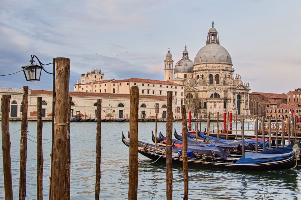 view of the Santa Maria delle Salute basilica in Venice, Italy, from St Regis Hotel, one of the best hotels in San Marco Venice with canal view